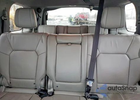 2014 Honda Pilot Touring z USA, uszkodzony, nr VIN 5FNYF4H90EB019054